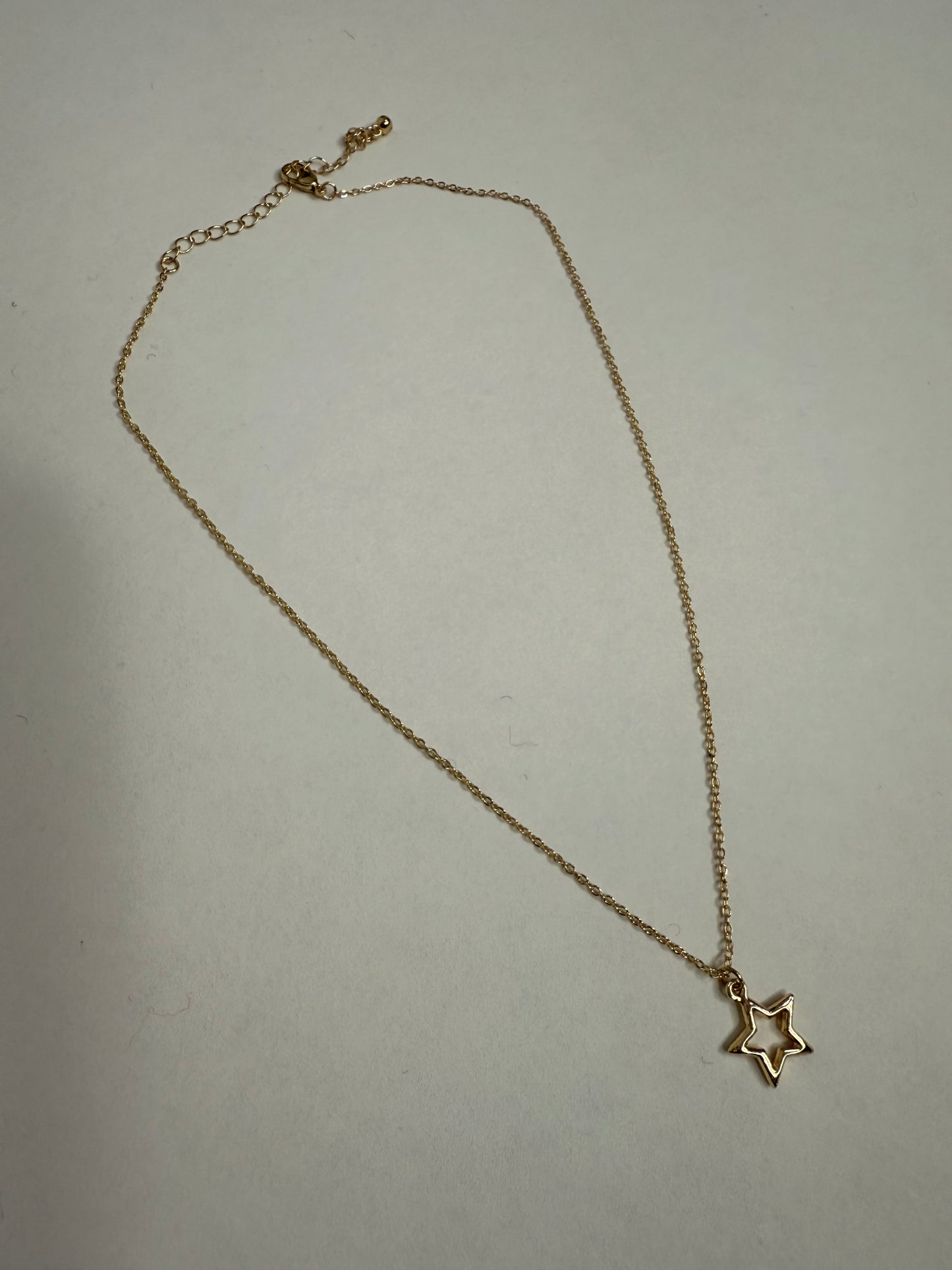 Gold star necklace