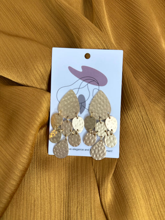 Gold large dangle design earrings